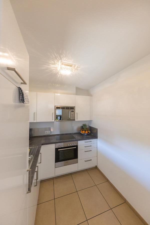 Deluxe Apartment B kitchen balcony or terrace