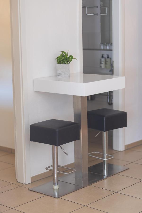 Deluxe Apartment B kitchen balcony or terrace